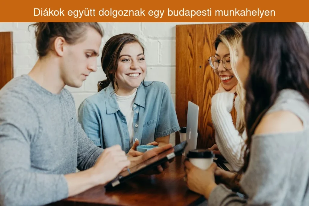 Diákok együtt dolgoznak egy budapesti munkahelyen